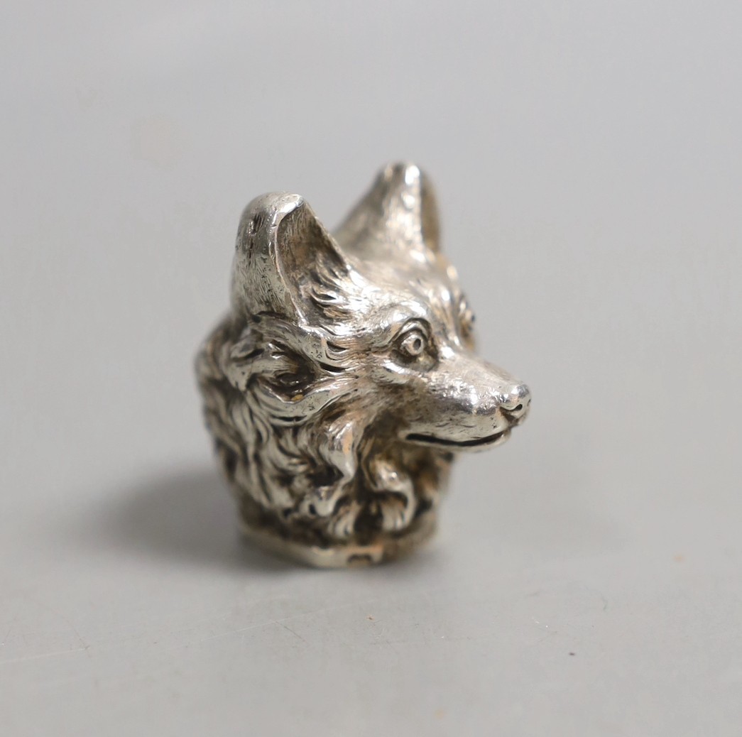 A late Victorian silver cane handle?, modelled as a dog's head, import marks for London, 1897, 35mm.